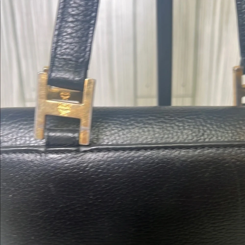 MCM Black Mini Tote with Gold Accents and Trapezoid Shape